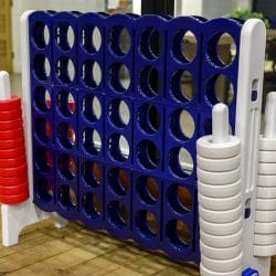 Giant Connect 4 game standing on the deck