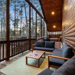 Porch seating and a giant Connect Four along the railing