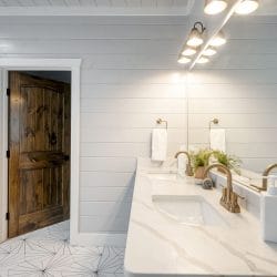 Vanity with a mirror and two wood doors