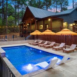 Loungers and yellow scalloped umbrellas beside the pool