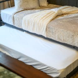 Close view of white bed linens
