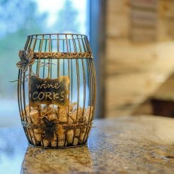 Decorative cage full of wine corks with a Wine Corks tag