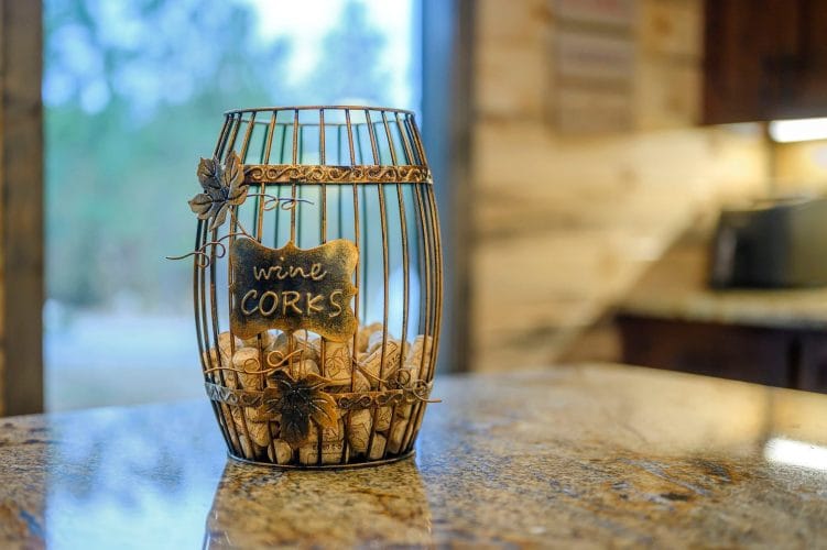 Decorative cage full of wine corks with a Wine Corks tag