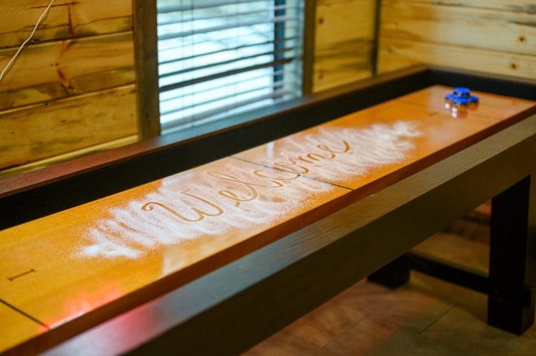 Welcome sign on a wood plank
