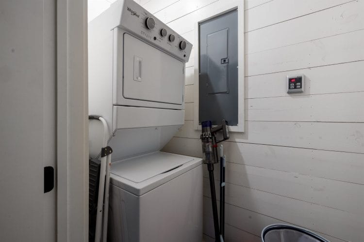 Stacked washer and dryer in a closet