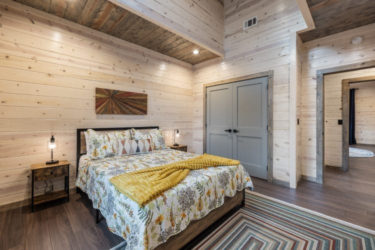 Second queen bedroom from the foot of the bed, with a closet