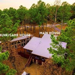 Aerial of the game house and the main house with the two building names written on the photo