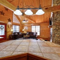 Island counter looking toward the living room and the stone fireplace