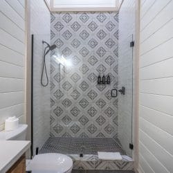 Walk-in shower with patterned tile