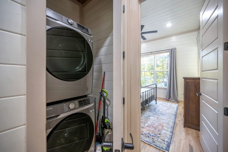 Stacked washer and dryer in a closet