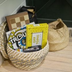 Basket of board games and a checkerboard
