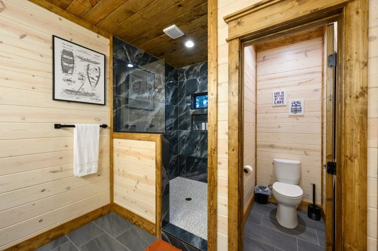 Tile shower and a separate toilet room