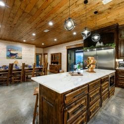 Kitchen island with the dining table behind it