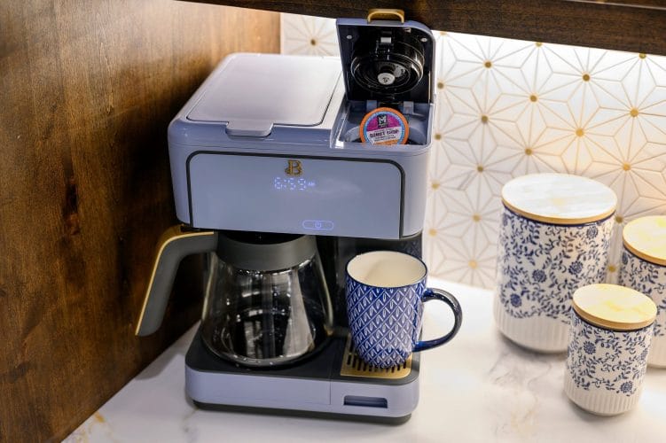 Coffee maker with a mug on the kitchen counter