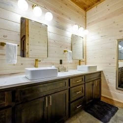 Double vanity with two vessel sinks and a large mirror