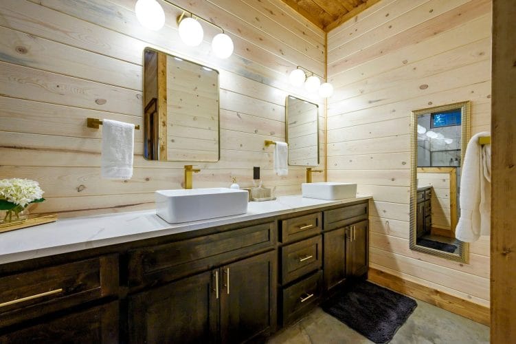 Double vanity with two vessel sinks and a large mirror