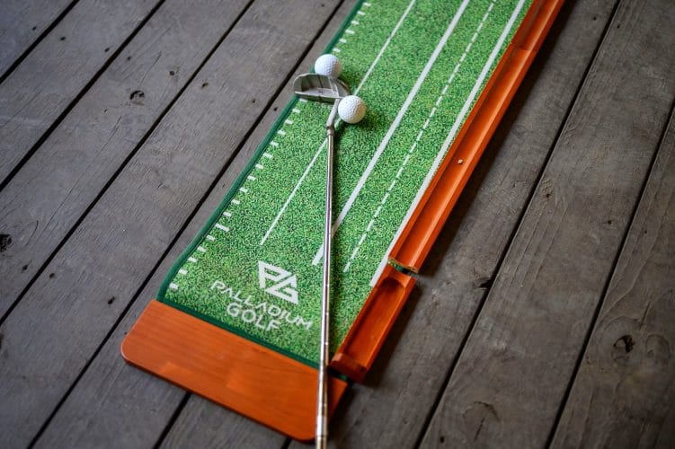 Putting mat laid out on the covered patio deck