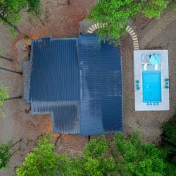 Aerial of the roof with the pool beside it