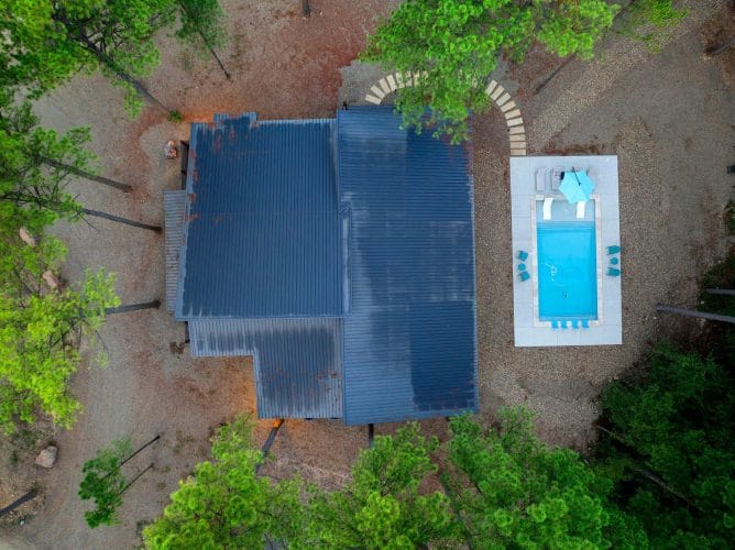 Aerial of the roof with the pool beside it