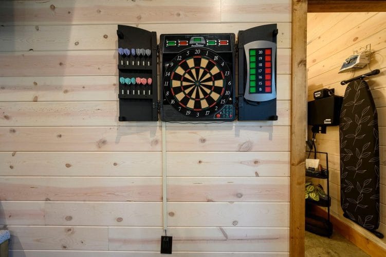 Electronic dartboard mounted on the wall