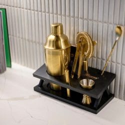 Gold cocktail shaker set on the counter