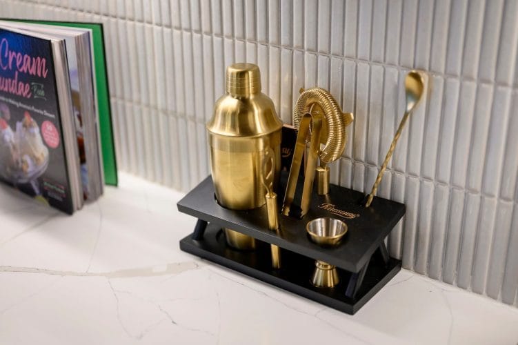 Gold cocktail shaker set on the counter