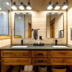 Double vanity with a hand towel and soap on a tray