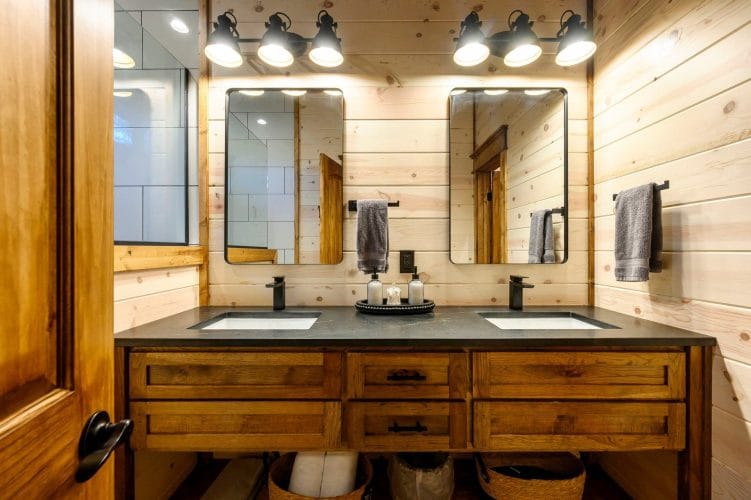 Double vanity with a hand towel and soap on a tray