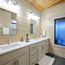 Double vanity with brass faucets