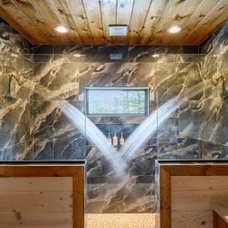 Large tile shower with two rain heads