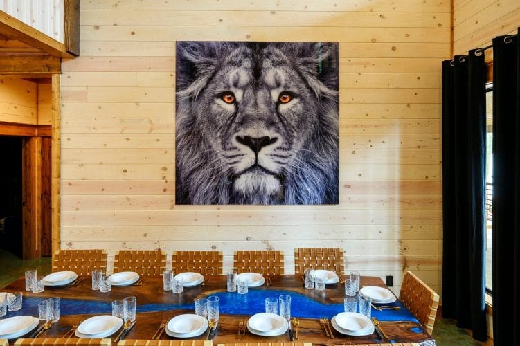 Lion portrait above the long dining table