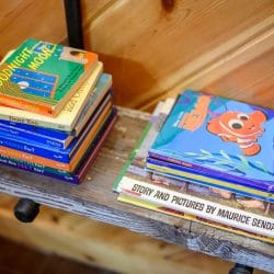 Stack of children's books on a shelf