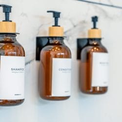 Wall-mounted shampoo, conditioner and body wash dispensers
