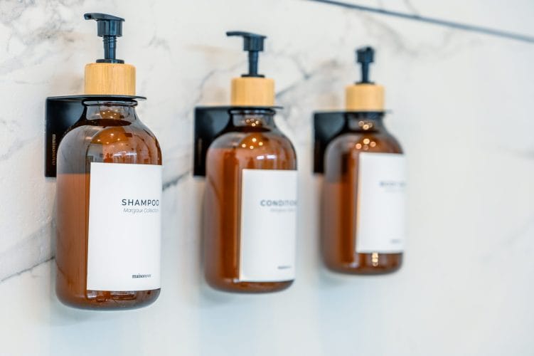 Wall-mounted shampoo, conditioner and body wash dispensers