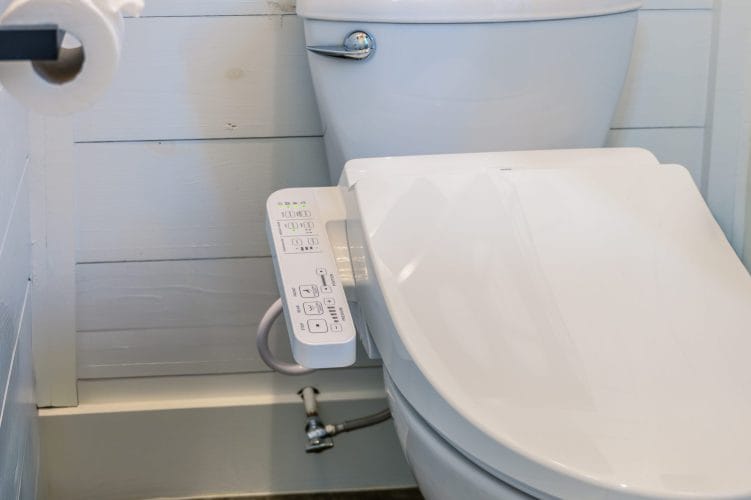 Toilet with a bidet-seat control panel (close-up)